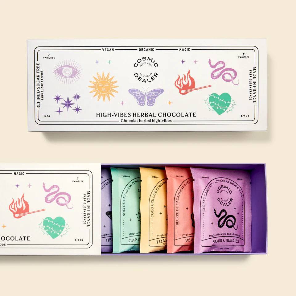 COSMIC DEALER Chakra Box mit 7 verschiedenen Nussbutter-Dunkelschokoladen.