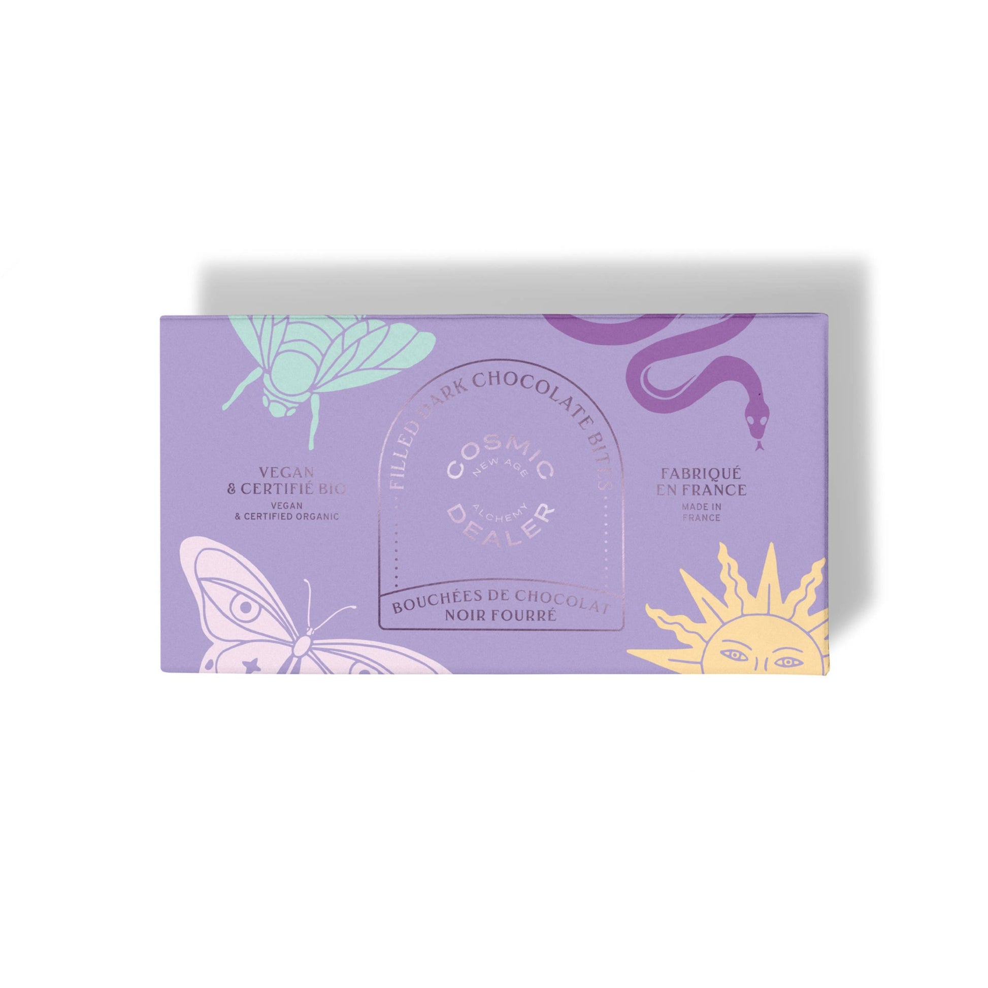 Geöffnete Geschenkbox mit 14 Chakra-Pralinen von Cosmic Dealer, kunstvoll aufgereiht.