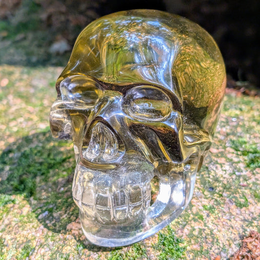 KristallschaedelTaturausgelb-orangemObsidianmitschwarzerMasse