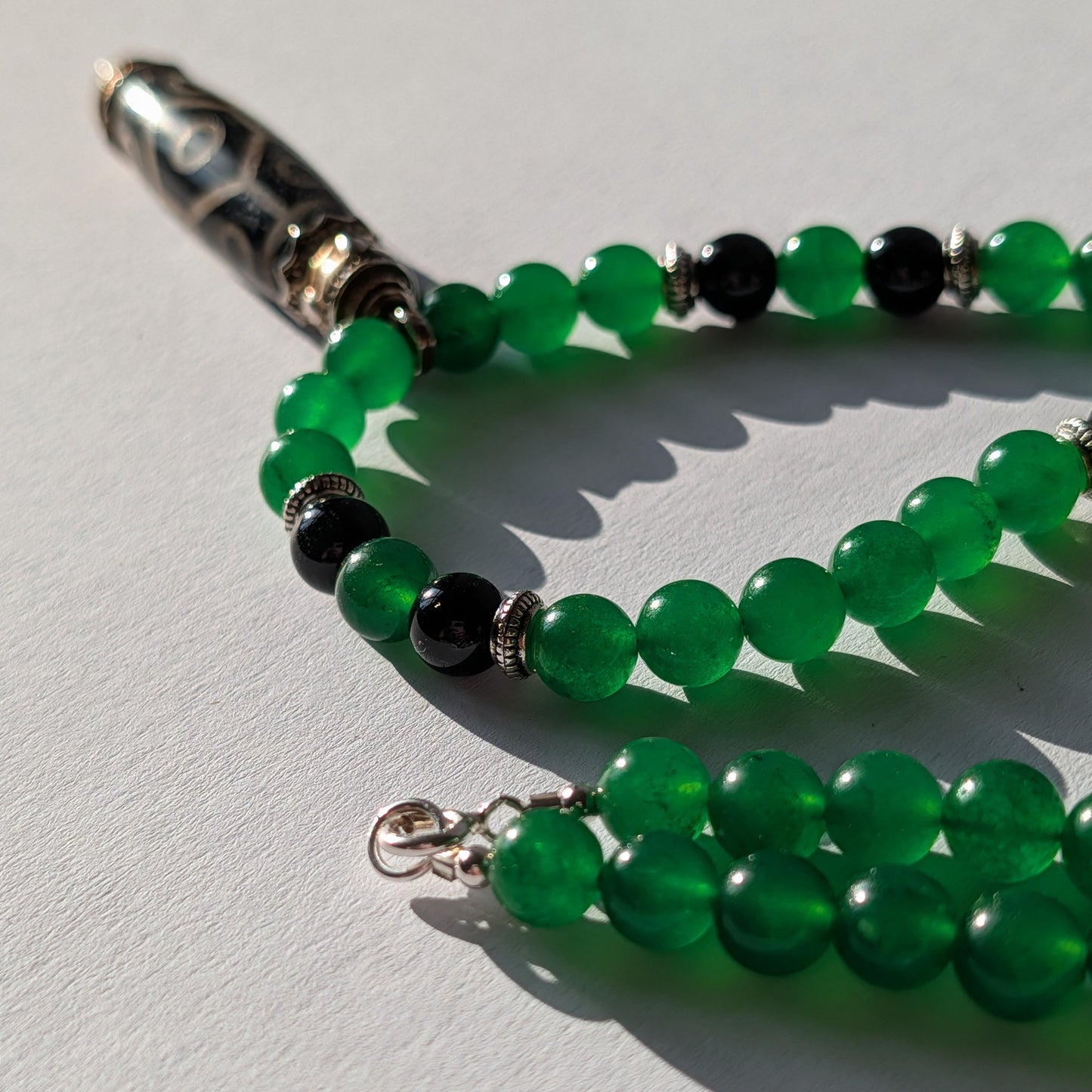 Dzi Halskette 9 Augen Schildplatt Smaragd Obsidian Buddhistischer Talisman Temple of Desire