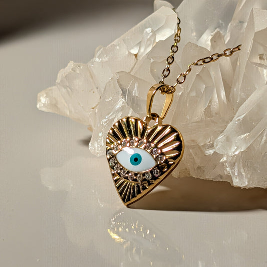 Goldener Herz-Anhänger mit blauem Bösen Blick (Evil Eye) und Strahlen-Design
