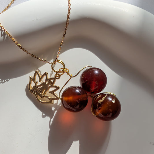 Karibische Bernstein Halskette mit spirituellem Anhänger