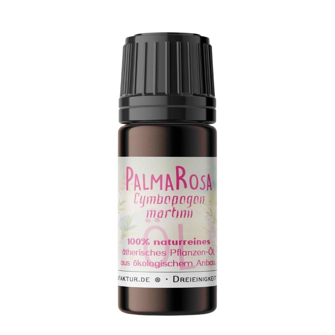 Palmarosa ätherisches Öl von Ritualmanufaktur – Braunglasfläschchen mit rosa Etikett vor weißem Hintergrund